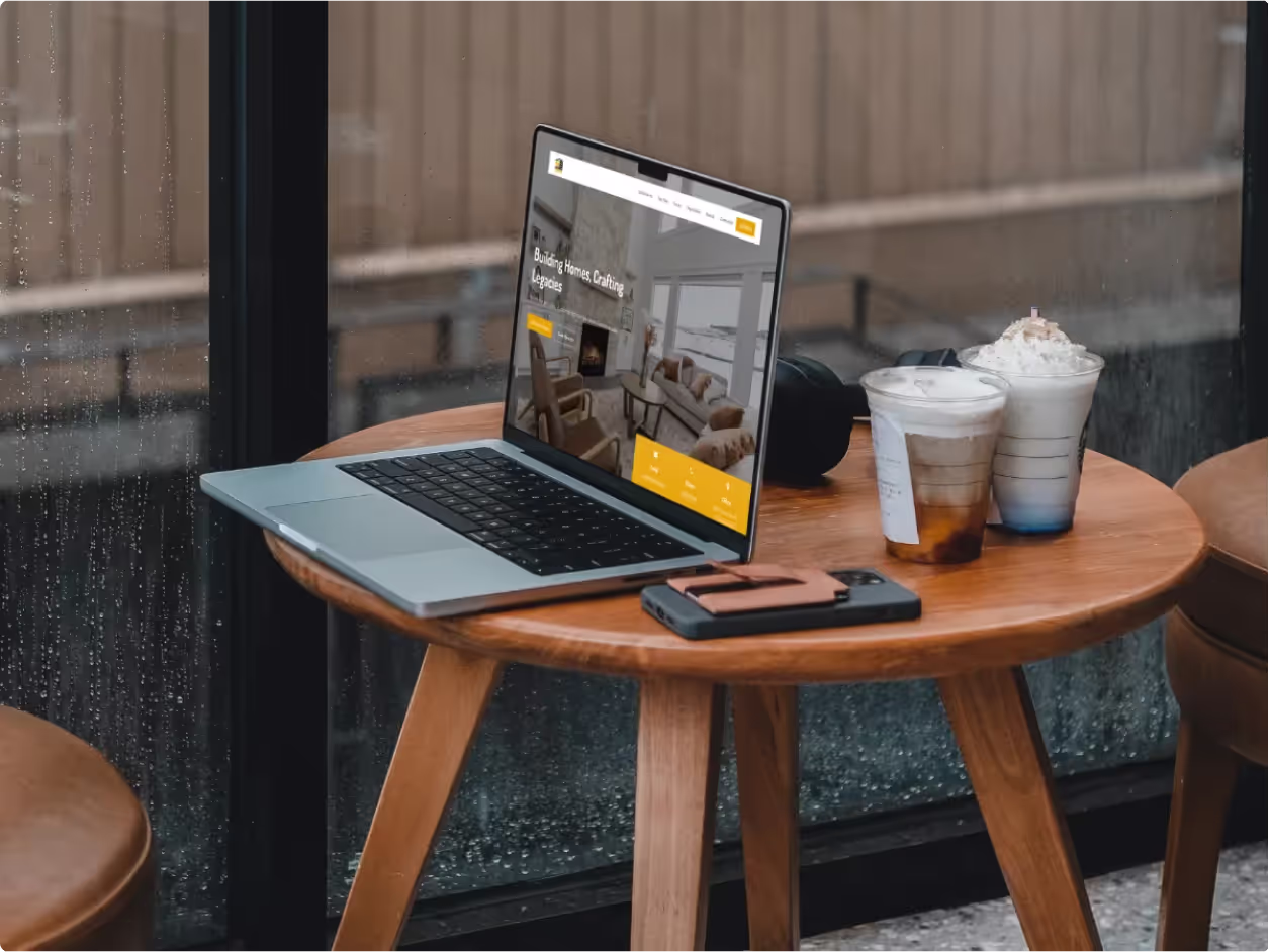 image of someone at a coffee shop looking for a home on website